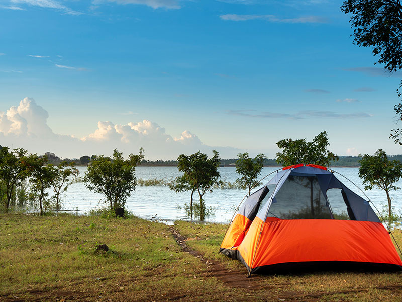 Tent on a river bank